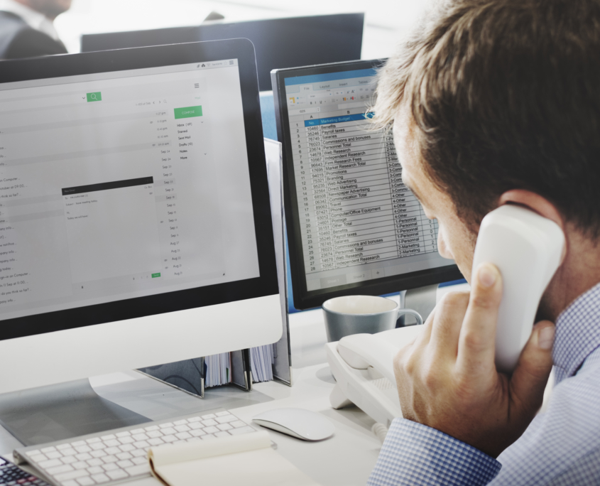Businessman using a telephone during a business call